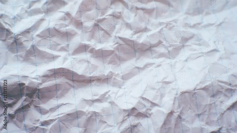 surface of an old crumpled paper sheet closeup. surface of an old crumpled paper sheet closeup.