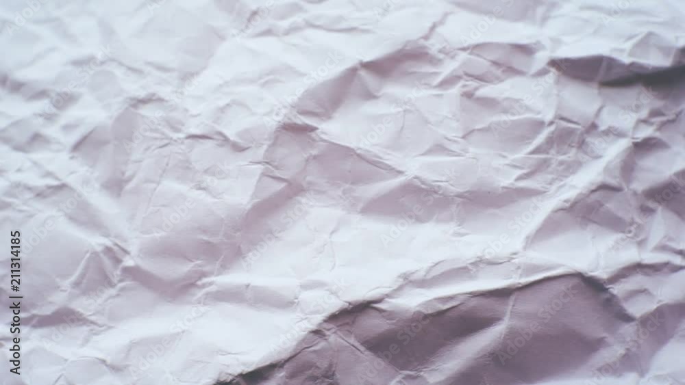 surface of an old crumpled paper sheet closeup. surface of an old crumpled paper sheet closeup.