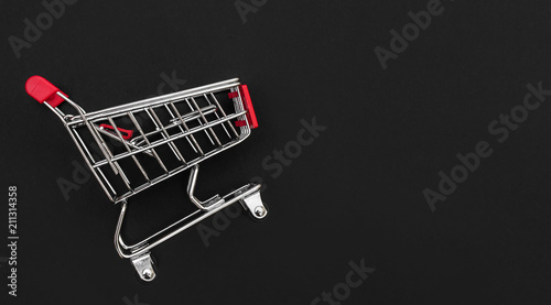 Shopping cart on black.