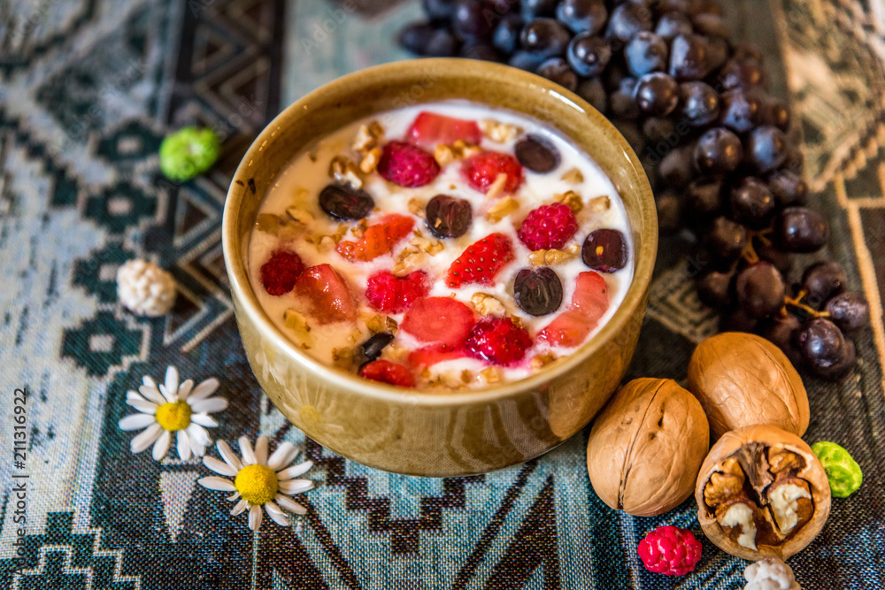 Granola. Granola with yogurt, honey and berries, nuts