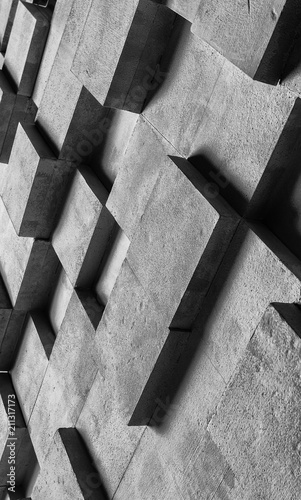 Fototapeta Naklejka Na Ścianę i Meble -  The texture wall is lined with cubes, black and white