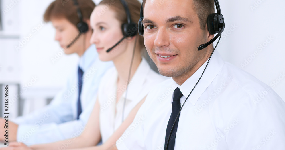 Young business man in headset. Call center Young business man in headset. Call center