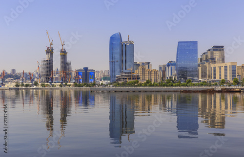 Reflection of buildings in the Caspian Sea in Baku