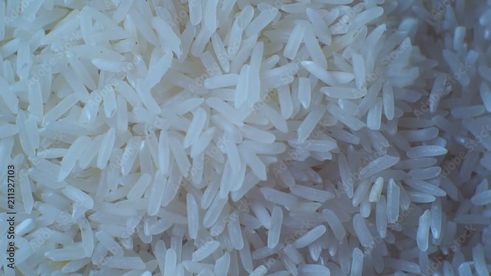 peeled ripe grain of rice.closeup.motion background peeled ripe grain of rice.closeup.motion background
