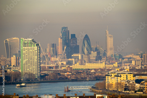 Financial district of London seen across winter polluted air 