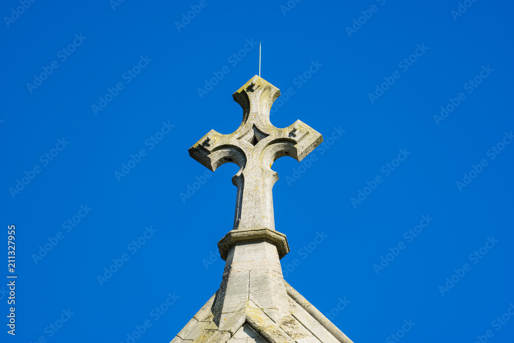 Cross isolated on blue sky 