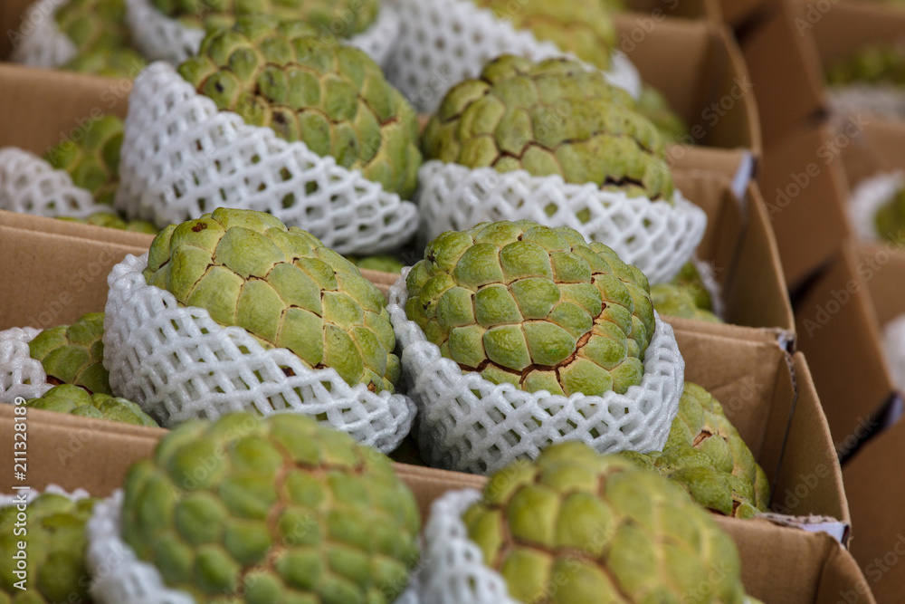 Obraz premium Cherimoya (Also Spelled Chirimoya) Fruit on display at a local market in Taiwan. This delicious fruit is also referred to as Annona in some South American countries.