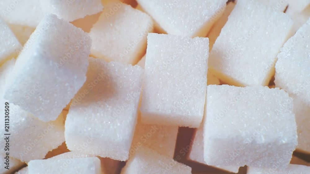 lump sugar in cubes.closeup.Abstract motion background for your design. lump sugar in cubes.closeup.Abstract motion background for your design.