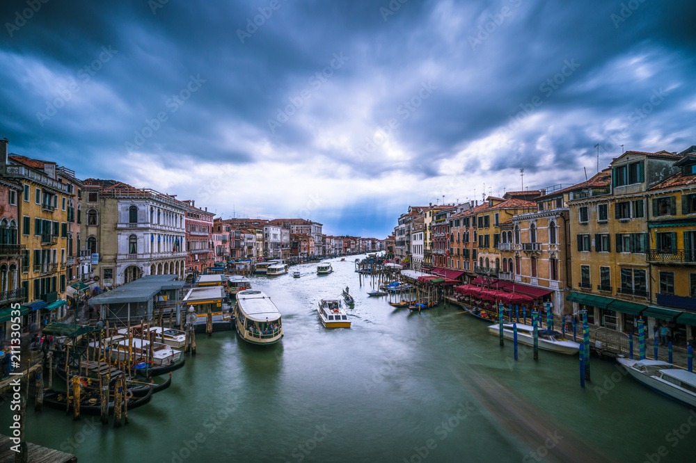 Scenery of Grand canal in Venice with cloudy blue sky 