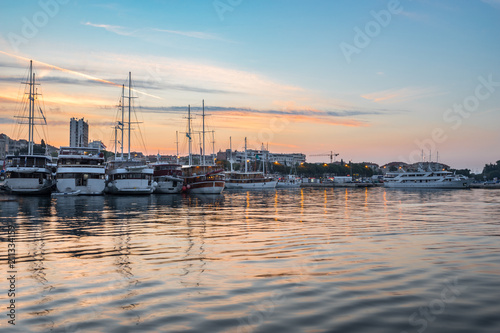 Harbor in Split, Croatia with yachts at sunrise