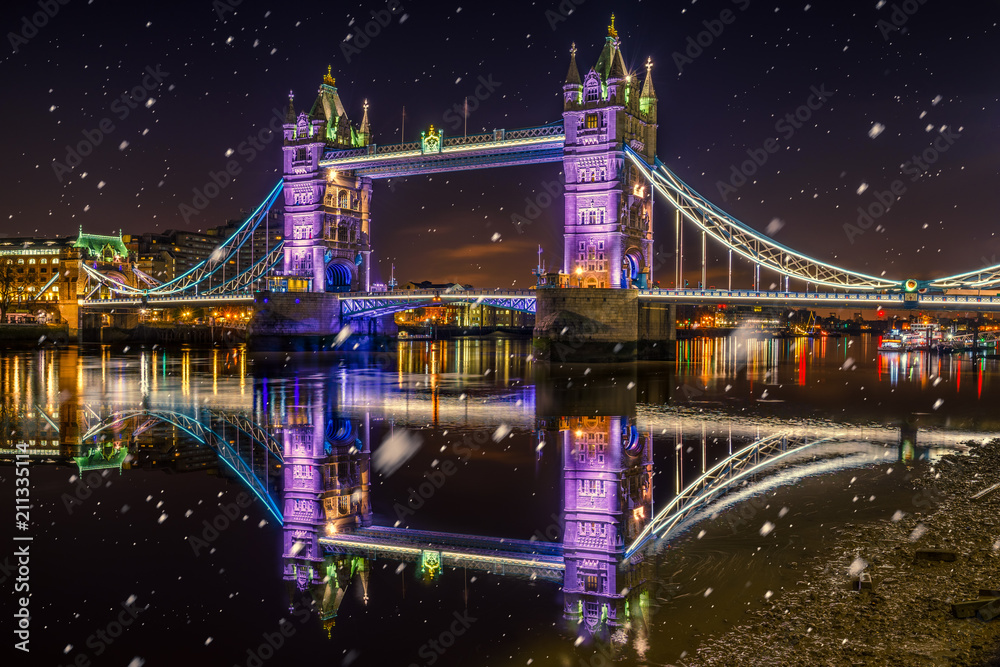 Fototapeta Tower Bridge with Christmas lights and falling snow