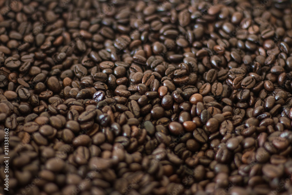 Dark roasted coffee beans through it.