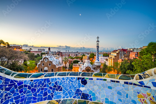 Barcelona cityscape at sunrise seen from public park Guell, Spain