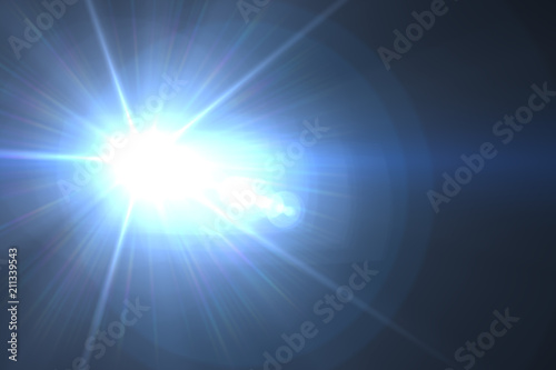 Abstract lens flare light over black background