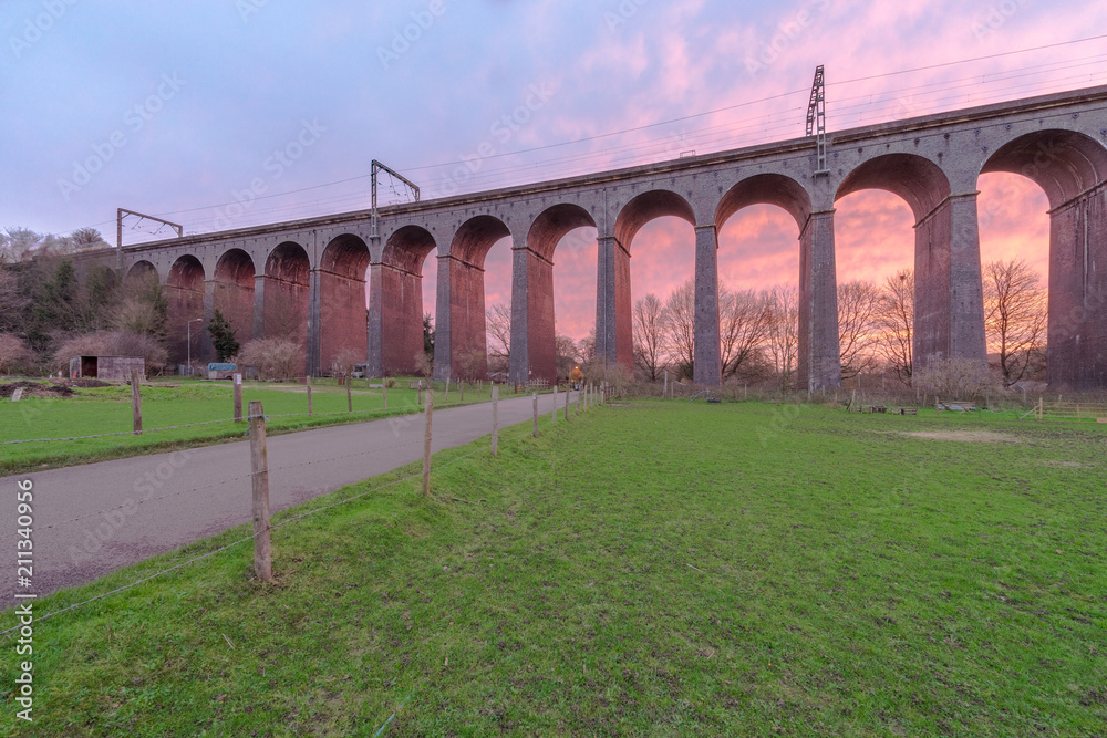 Railway viaduct at sunrise in Welwyn Garden City, England