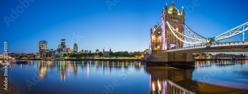 Panorama of Tower Bridge and skyscrapers of financial district in London, UK