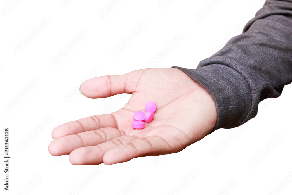 pills pink in hand male isolated on white background and clipping path. Stop drug use concept pills pink in hand male isolated on white background and clipping path. Stop drug use concept