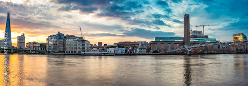 Morning panorama of London bankside including Millenium bridge  photo
