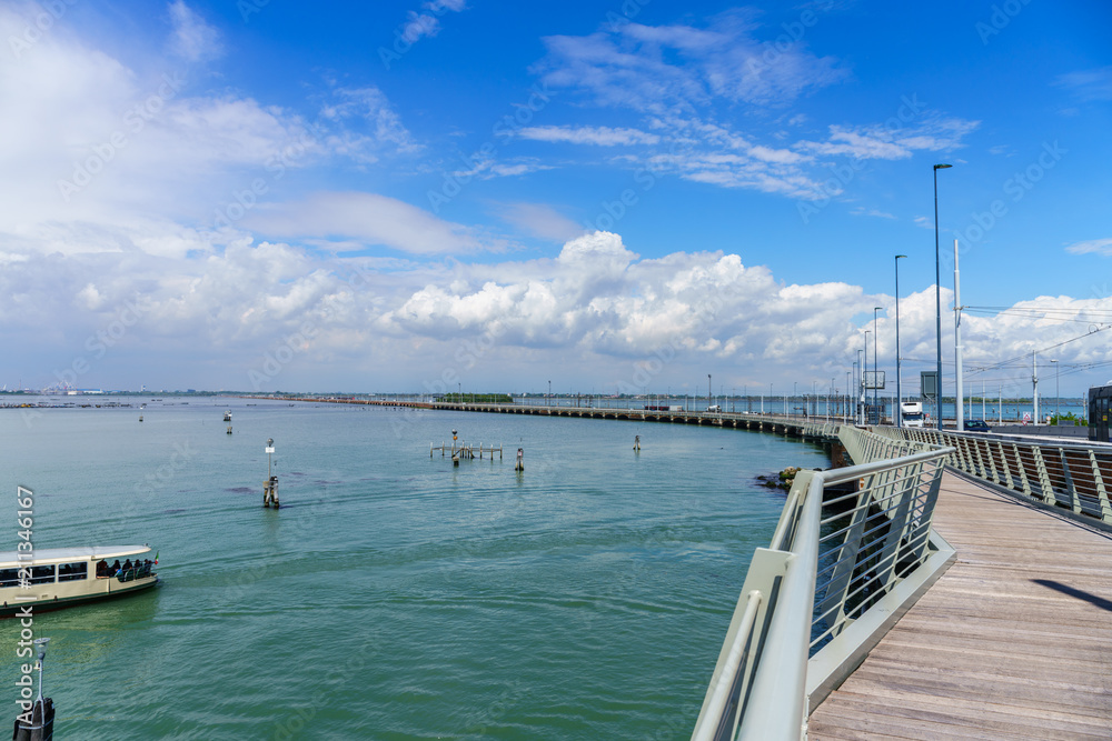 Via della Liberta bridge linking the Venice city to the mainland at sunny day, Italy Via della Liberta bridge linking the Venice city to the mainland at sunny day, Italy