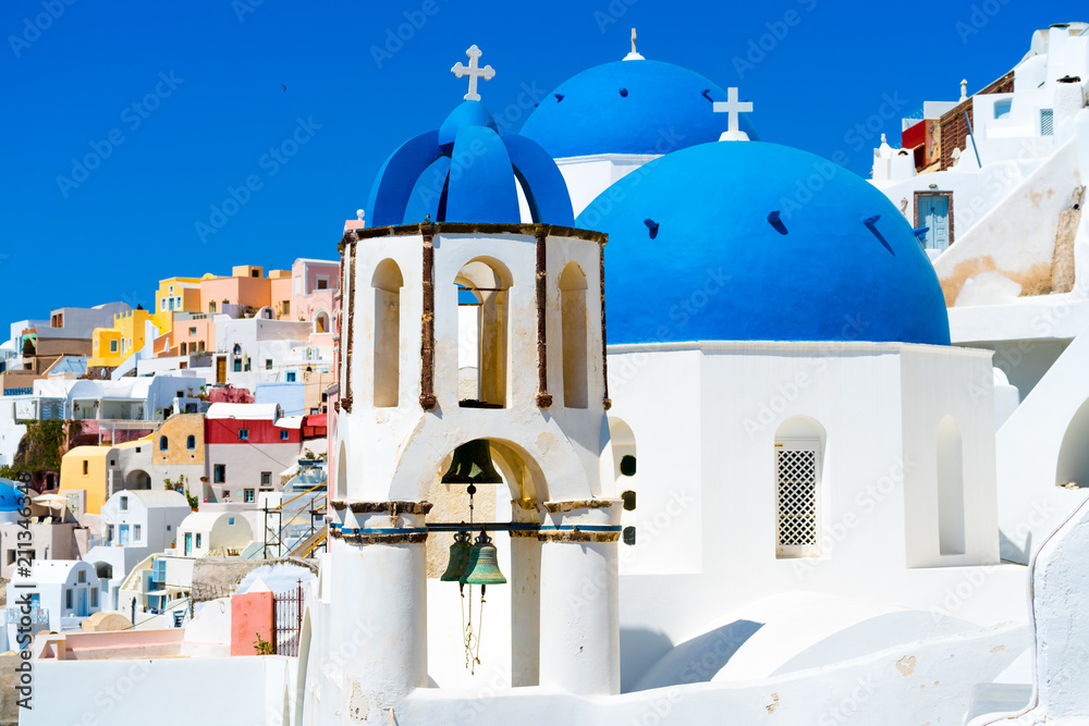 Blue dome of white church in Oia, Santorini, Greece