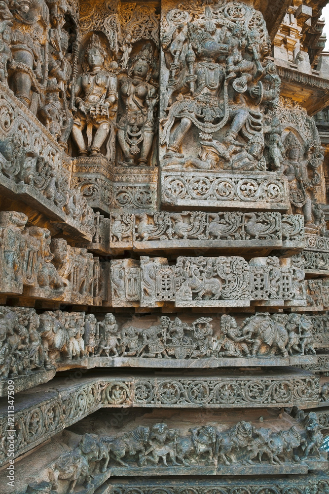 Ornate wall panel reliefs depicting Hindu deities, west side, Hoysaleshwara temple, Halebidu, Karnataka