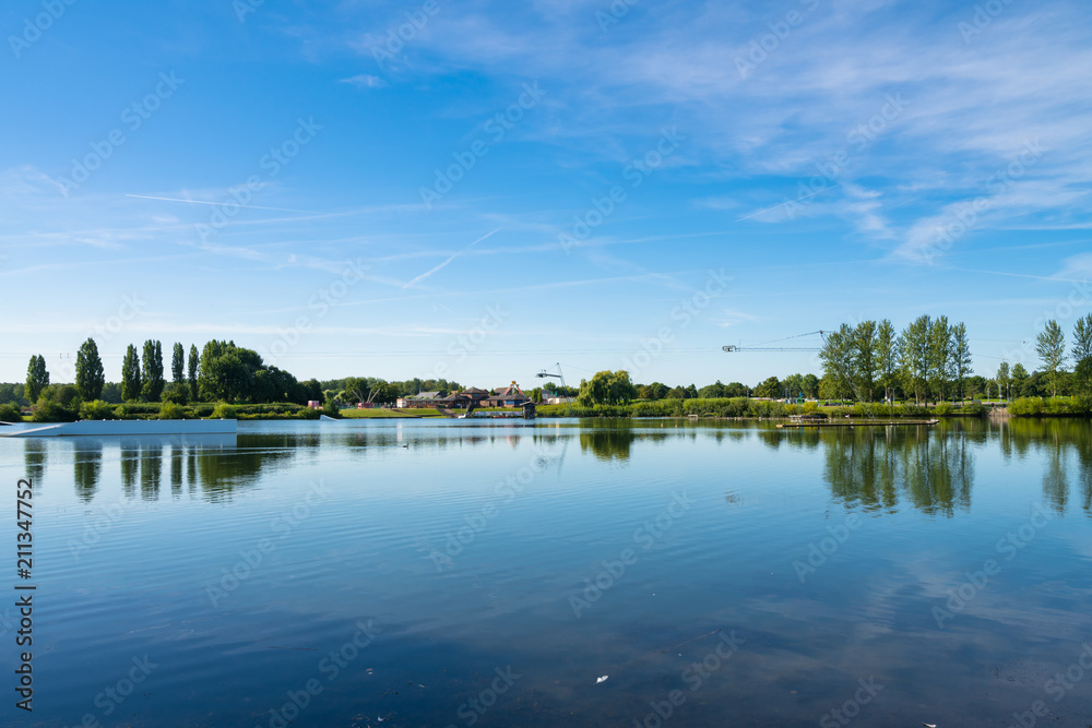Panorama of Willen Lake at sunny summer day 