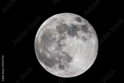 Full moon / The full moon is the lunar phase when the Moon appears fully illuminated from Earth's perspective. This occurs when Earth is located directly between the Sun and the Moon