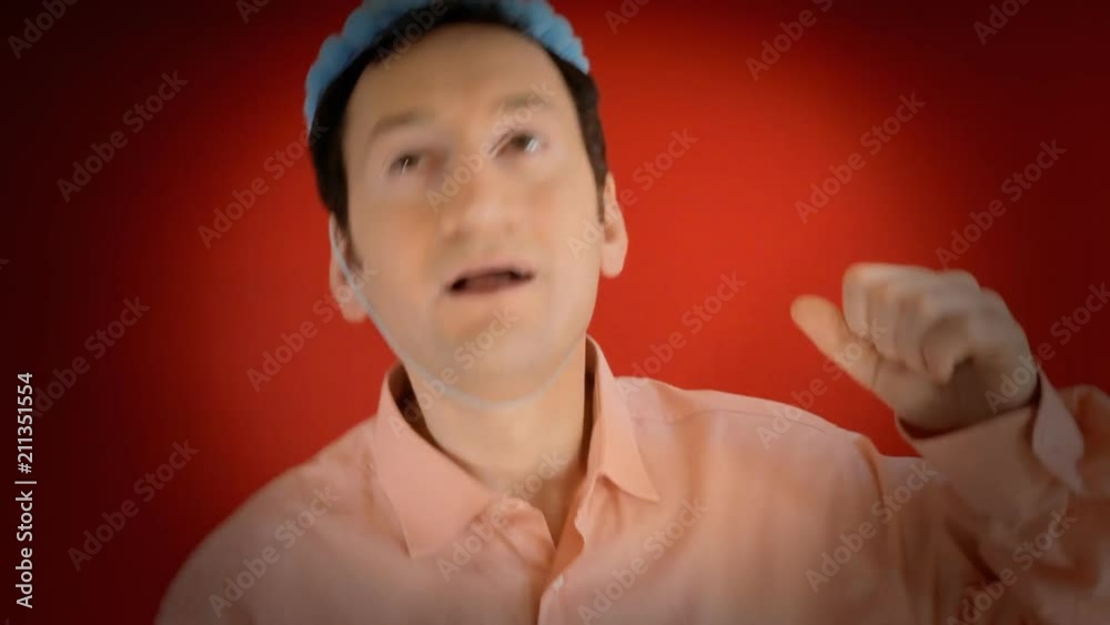 A funny ugly man at a party with a paper hat, squishing a horn, dancing, cheering, getting euphoric and then sleepy. Vignetted red background.
A funny ugly man at a party with a paper hat, squishing a horn, dancing, cheering, getting euphoric and then sleepy. Vignetted red background.