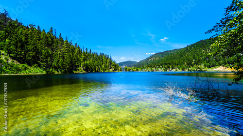 The crystal clear waters of Allison Lake along Highway 5A between the towns of Merritt and Princeton in British Columbia, Canada 