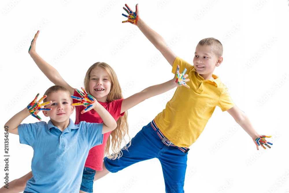 Three smiling kids with colourfull hands on white background - obrazy, fototapety, plakaty 