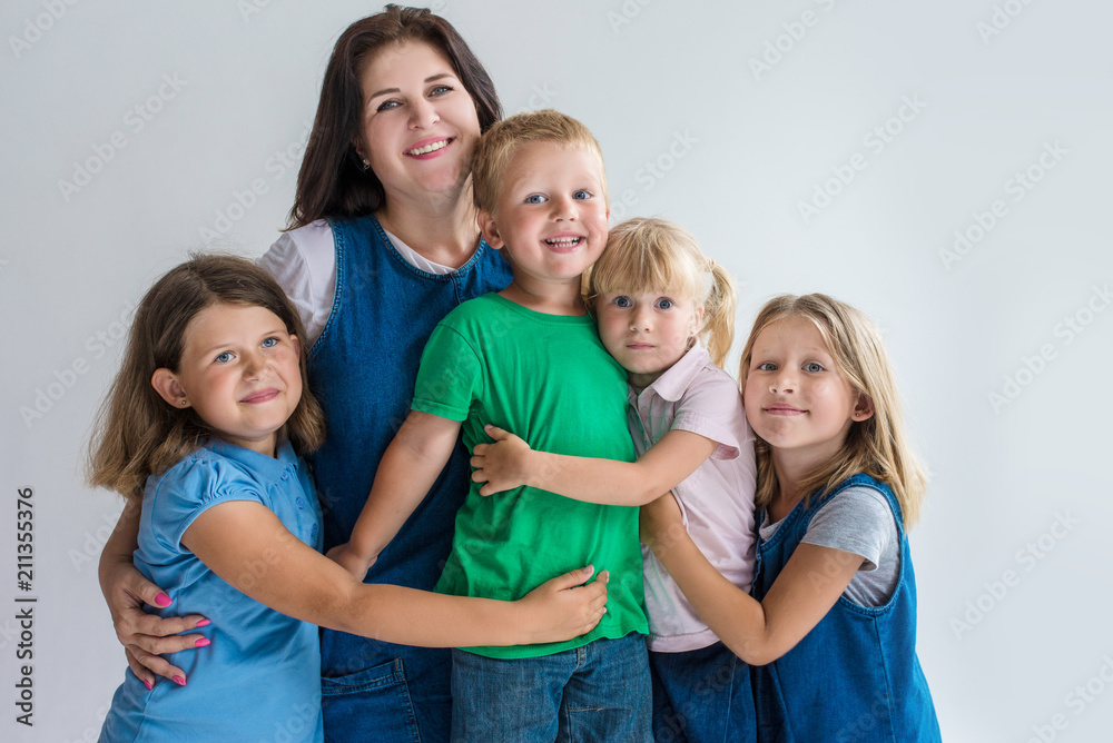 Mother and her four kids on white background Mother and her four kids on white background