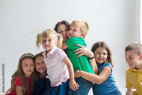 Mother and her kids on white background