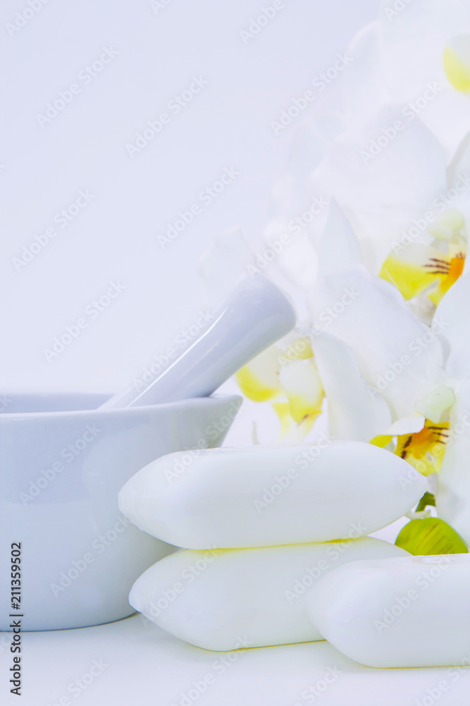 soaps, bowl and orchid. spa and relaxation concept soaps, bowl and orchid. spa and relaxation concept
