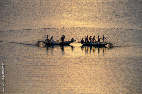 Fishing on the Damodar River during sunset © Himadri