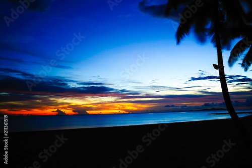 Enjoying sunset time in Denarau Island Fiji with orange blue sky and cloud for family vacation and couple honey moon retreat