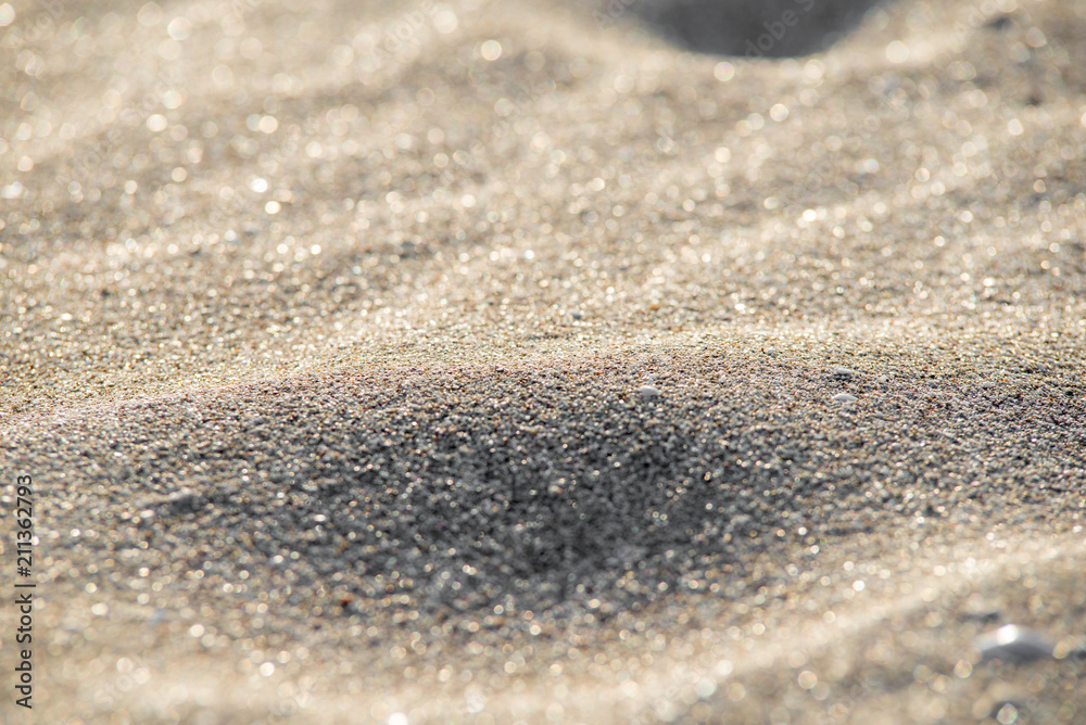 Soft Wave Of Blue Ocean On Sandy Beach. Background. Selective focus. Soft Wave Of Blue Ocean On Sandy Beach. Background. Selective focus.