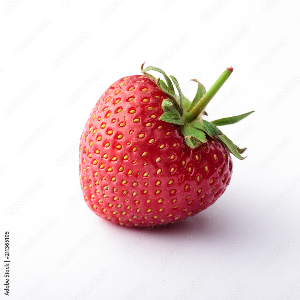 Strawberry fresh slanted closeup isolated on white background bright light Strawberry fresh slanted closeup isolated on white background bright light