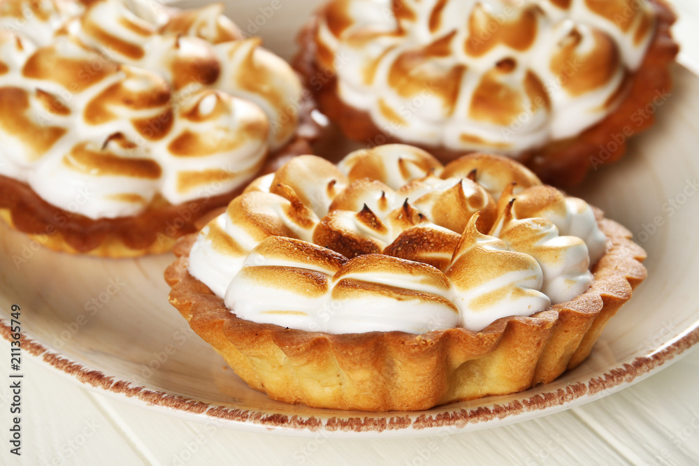 Delicious lemon pie on a plate, close-up