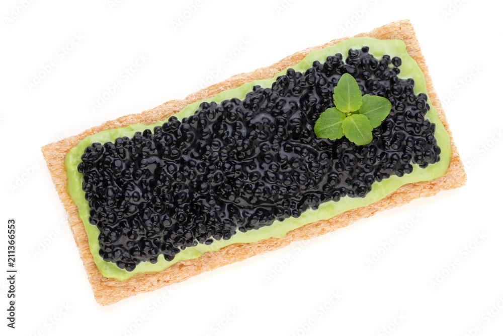 Canapes with black sturgeon caviar and spice isolated on the white background. Canapes with black sturgeon caviar and spice isolated on the white background.