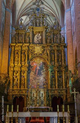 A 25 meter high wooden altar in medieval cathedral basilica in Pelplin in Gdansk Pomerania, Poland photo