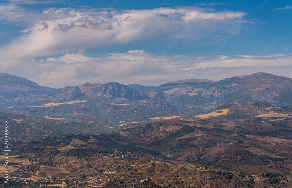 beautiful view of the mountains in the region of Andalusia, houses and farmland on the slopes of mountains beautiful view of the mountains in the region of Andalusia, houses and farmland on the slopes of mountains