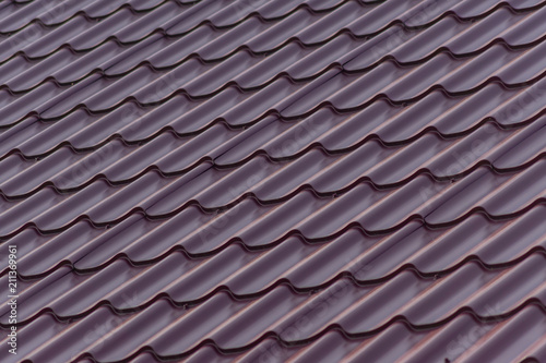 close up of red plastic roof tile for background