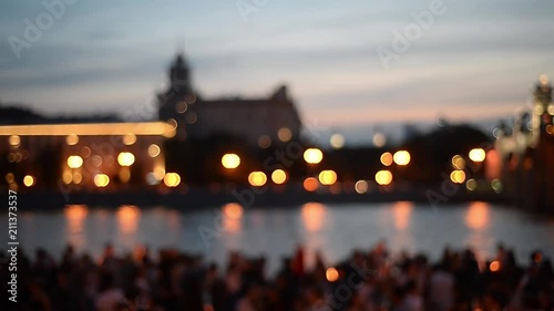 Wallpaper Mural Dancing on a hot summer night on the waterfront. Defocused image. Night lights and silhouettes Torontodigital.ca
