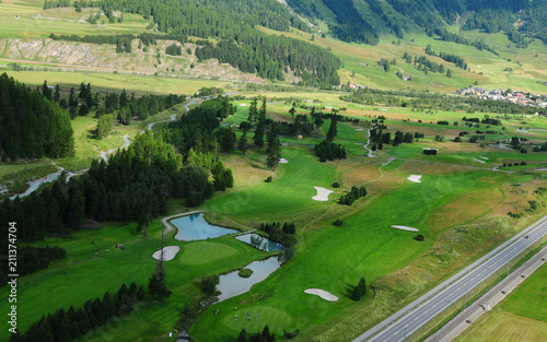 Swiss Alps: Paragliding-Airshot from the 18 hole golf-course in Samedan in the upper Engadin