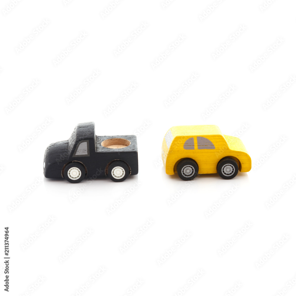 wooden car toy on white background.