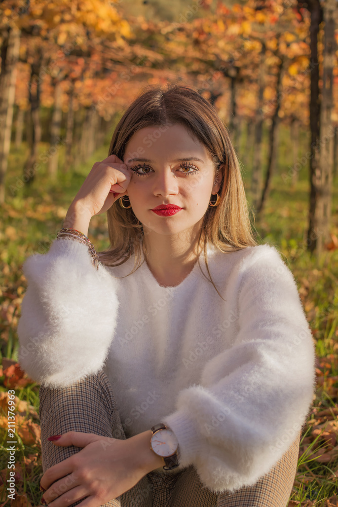 girl sitting in the nature under a gabled vine girl sitting in the nature under a gabled vine