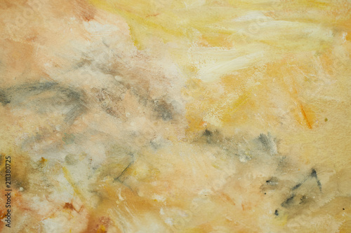 Texture, yellow wall with gray, ochre, brown strokes Closely
