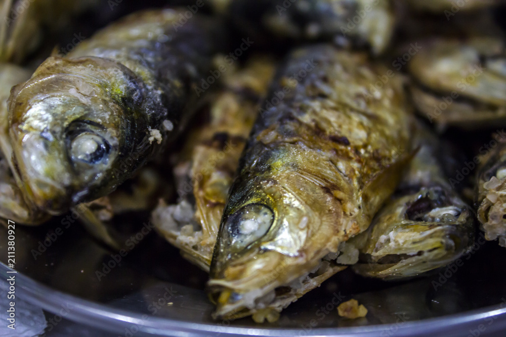 Fresh Grilled sardines close up Fresh Grilled sardines close up
