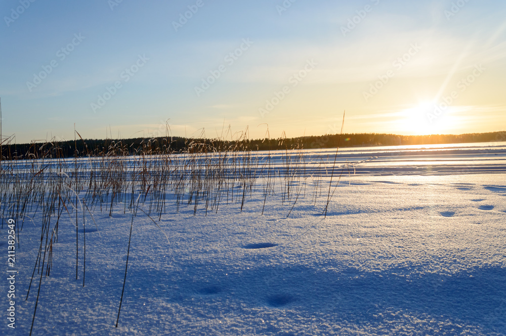 Skandinavien winter sunset frozen lake Skandinavien winter sunset frozen lake