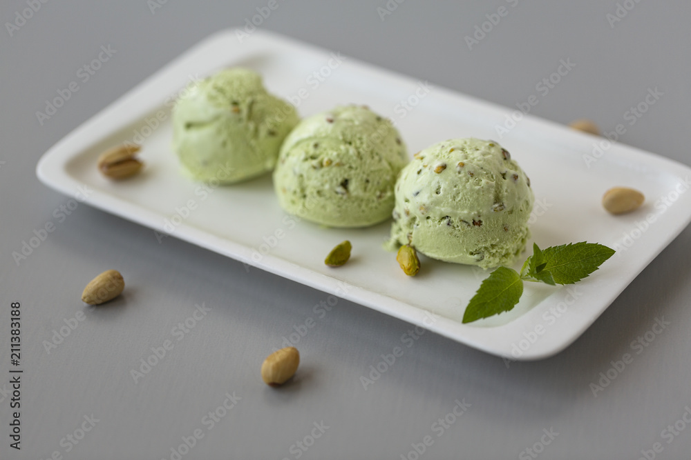Fresh pistachio ice cream, nuts and mint.